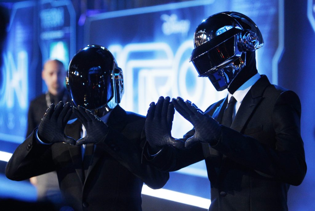 Musicians Thomas Banglater and Guy-Manuel de Homem-Christo of Daft Punk pose at the world premiere of the film "TRON: Legacy" in Hollywood, California, December 11, 2010. REUTERS/Danny Moloshok (UNITED STATES - Tags: ENTERTAINMENT) - RTXVNHM